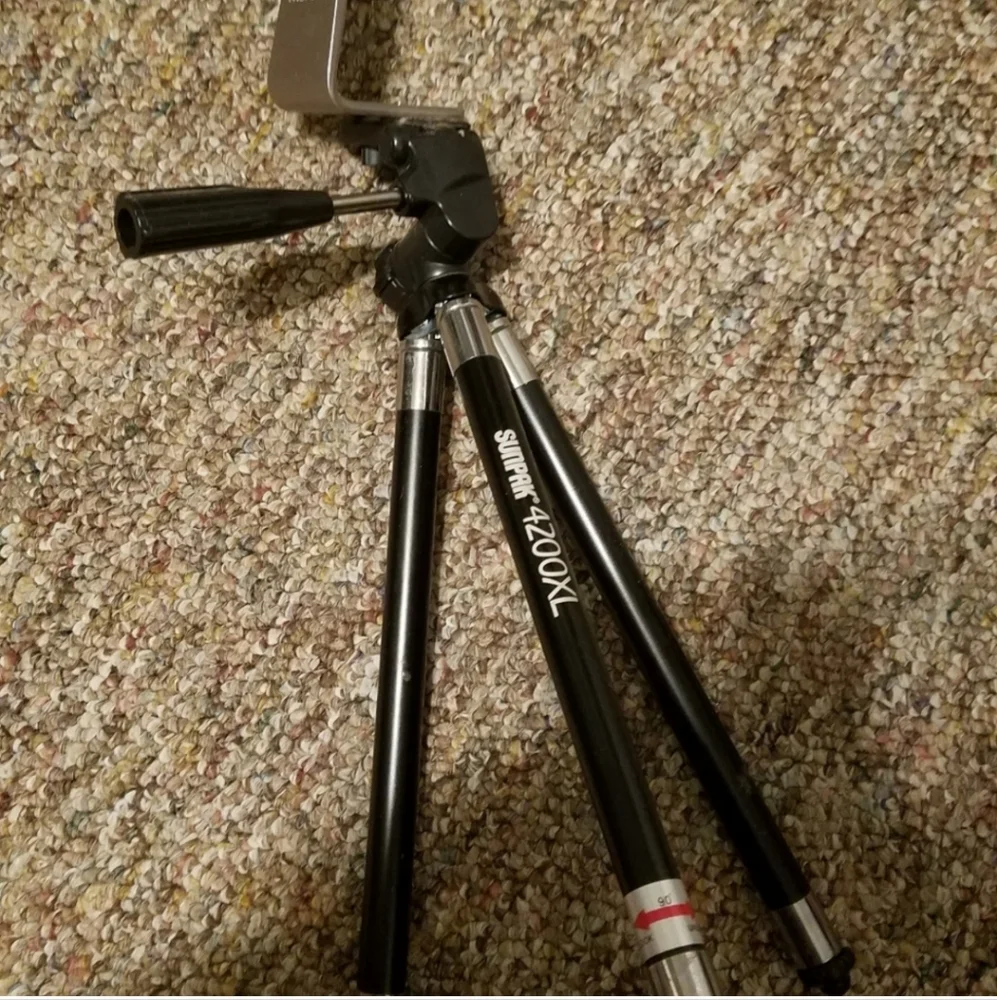 Tripod with phone adapter holster